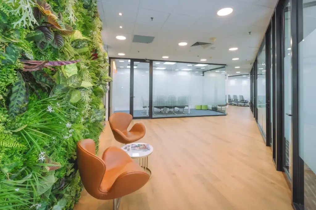 Centennial Business Suites- Suntec City Tower 2 Penthouse – Communal lounge with living green wall at Centennial Business Suites Suntec Tower Two Penthouse