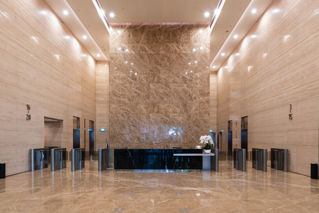 Plus @ Cecil Street – Plus @ 20 Cecil Street — double-height marble main lobby with lift lobbies, Singapore CBD