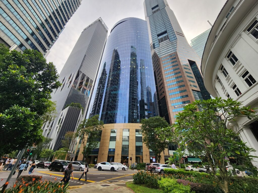 Plus @ 20 Cecil Street — curved glass Grade A office tower, junction of Cecil Street and Church Street, Raffles Place, Singapore