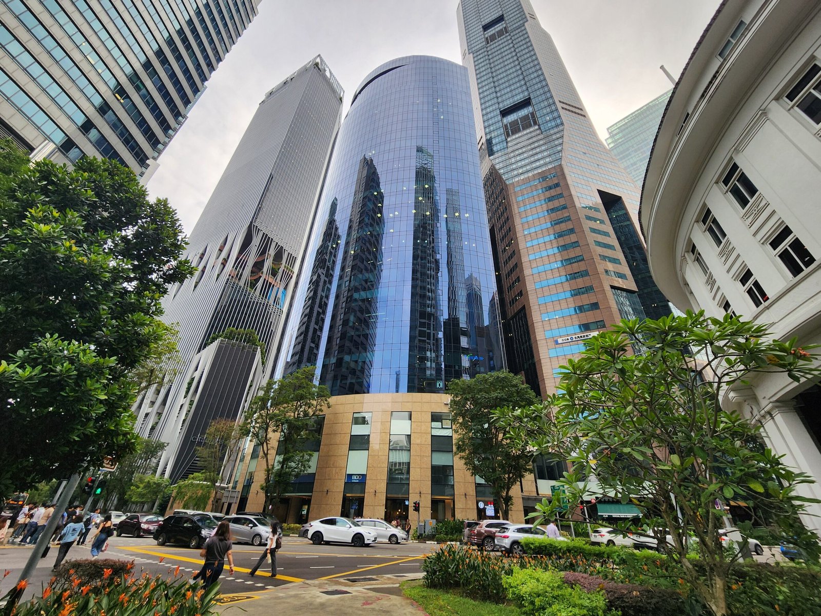 Plus @ 20 Cecil Street — curved glass Grade A office tower, junction of Cecil Street and Church Street, Raffles Place, Singapore