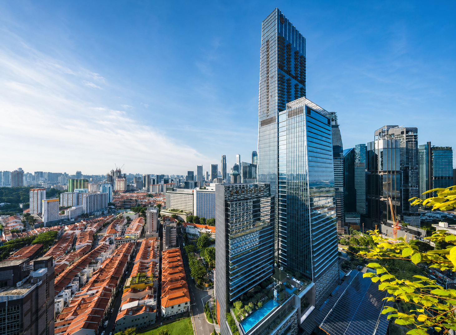 Guoco Tower rising above the Tanjong Pagar conservation shophouses and the Singapore CBD skyline.